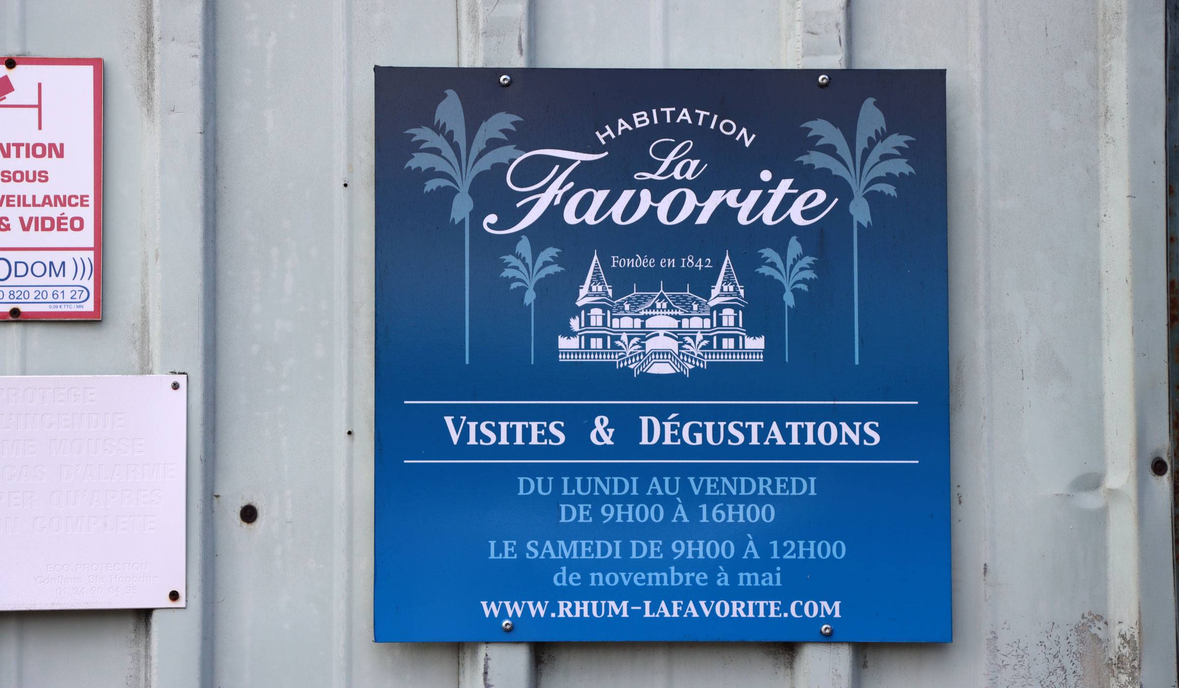 Entrance sign to La Favorite distillery