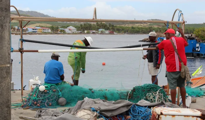 Pêcheurs entrain de remonter leurs filets